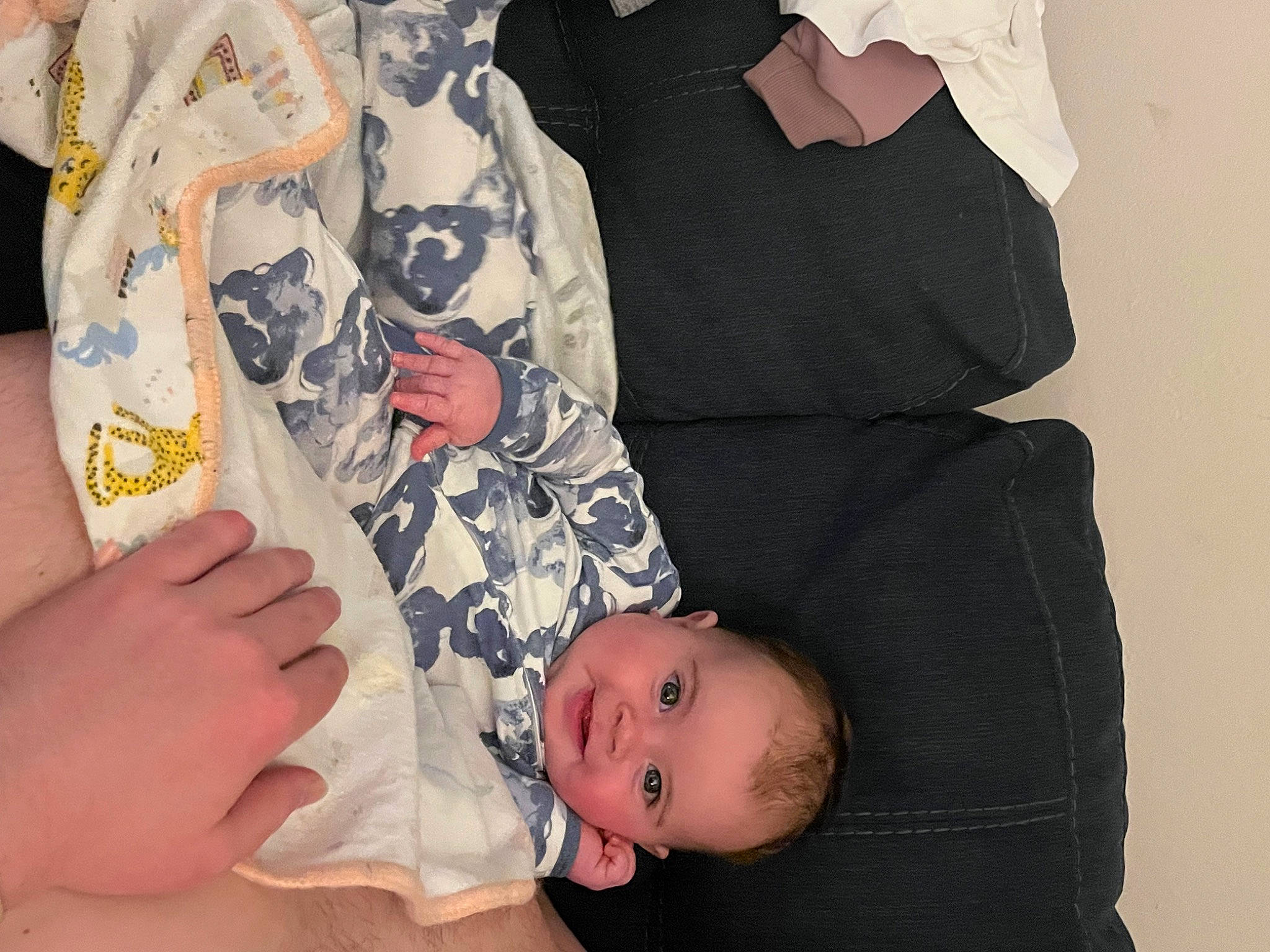 Matilda is registered to the contest to win money with this photo: abdomen, baby, baby_products, baby_toddler_clothing, chest, child, comfort, finger, foot, gesture, hand, joy, linens, nail, pattern, person, product, sleeve, thigh, thumb