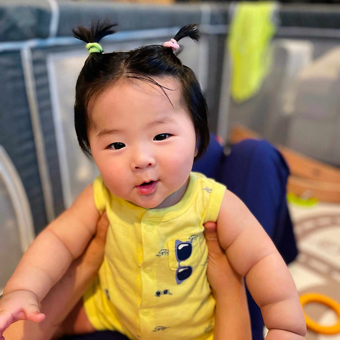 Ari is registered to the contest to win money with this photo: baby, blackhair, bodypart, couch, cushion, face, finger, frown, furniture, hair, hand, head, homedecor, people, person, photography, portrait, sad, shoulder, sitting