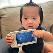 Ari joined the competition — help win amazing prizes! baby, bodypart, computer, computerhardware, couch, electronics, face, finger, furniture, hand, hand_heldcomputer, hardware, head, mobilephone, monitor, person, phone, photography, portrait, screen