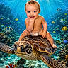 baby, child, sea_turtle, underwater, ocean, coral_reef, fish, clownfish, tropical_fish, marine_life, water, sunlight, diaper, smiling, cute, nature, aquatic, blue, reef, playful