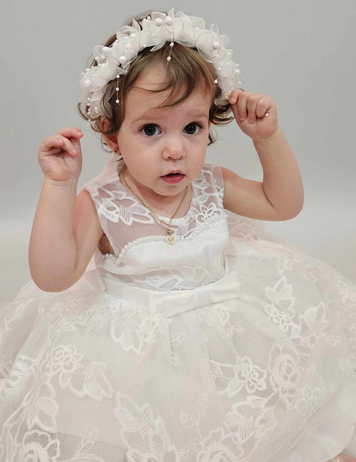 Alaia is registered to the contest to win money with this photo: toddler, child, dress, white_dress, lace, headband, pearl, portrait, cute, small_person, jewelry, necklace, curly_hair, studio, fashion, young_child, innocent, female, person, adorable