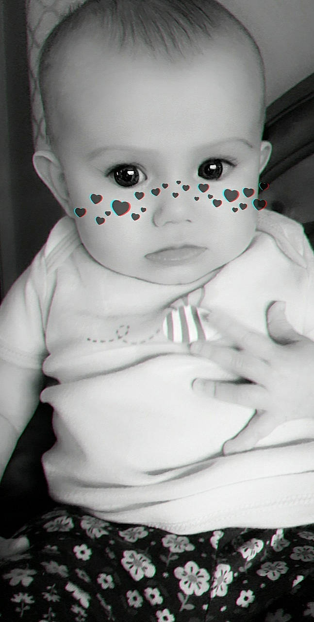 Emori is registered to the contest to win money with this photo: baby, black_and_white, cheek, child, doll, eye, face, fictional_character, forehead, head, lip, person, toddler, toy, white