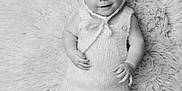Jonah joined the competition — help win amazing prizes! baby, infant, smiling, cute, knitted_clothing, bear_ears, plush_blanket, soft_texture, black_and_white, portrait, lying_down, happy, child, cozy, adorable, small_hands, baby_clothes, infant_fashion, warm, peaceful