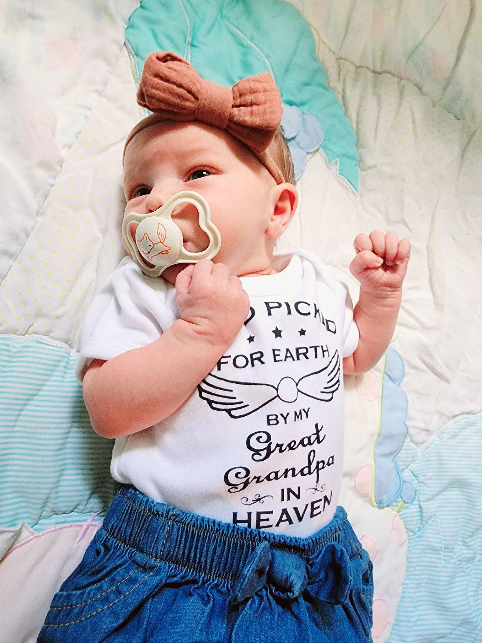 Keerah is registered to the contest to win money with this photo: baby, baby_toddler_clothing, bedding, child, denim, eyelash, fun, gesture, happy, linens, pattern, person, pink, portrait_photography, skin, sleeve, sweetness, t_shirt, textile, toddler