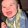 Benjamin joined the competition — help win amazing prizes! baby, baby_girl_or_boy, child, closeup, clothing, cute, dinosaur_print, expression, face, hand, happy, hooded_jacket, indoor, infant, joyful, person, portrait, sitting, smiling, young