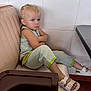 Hollis joined the competition — help win amazing prizes! child, girl, pout, crossed_arms, booth_seat, beige_seat, white_sandals, light_blue_outfit, green_trim, tiled_wall, indoor, casual_clothing, footwear, expression, sad, waiting, restaurant, floor, hair_ties, portrait