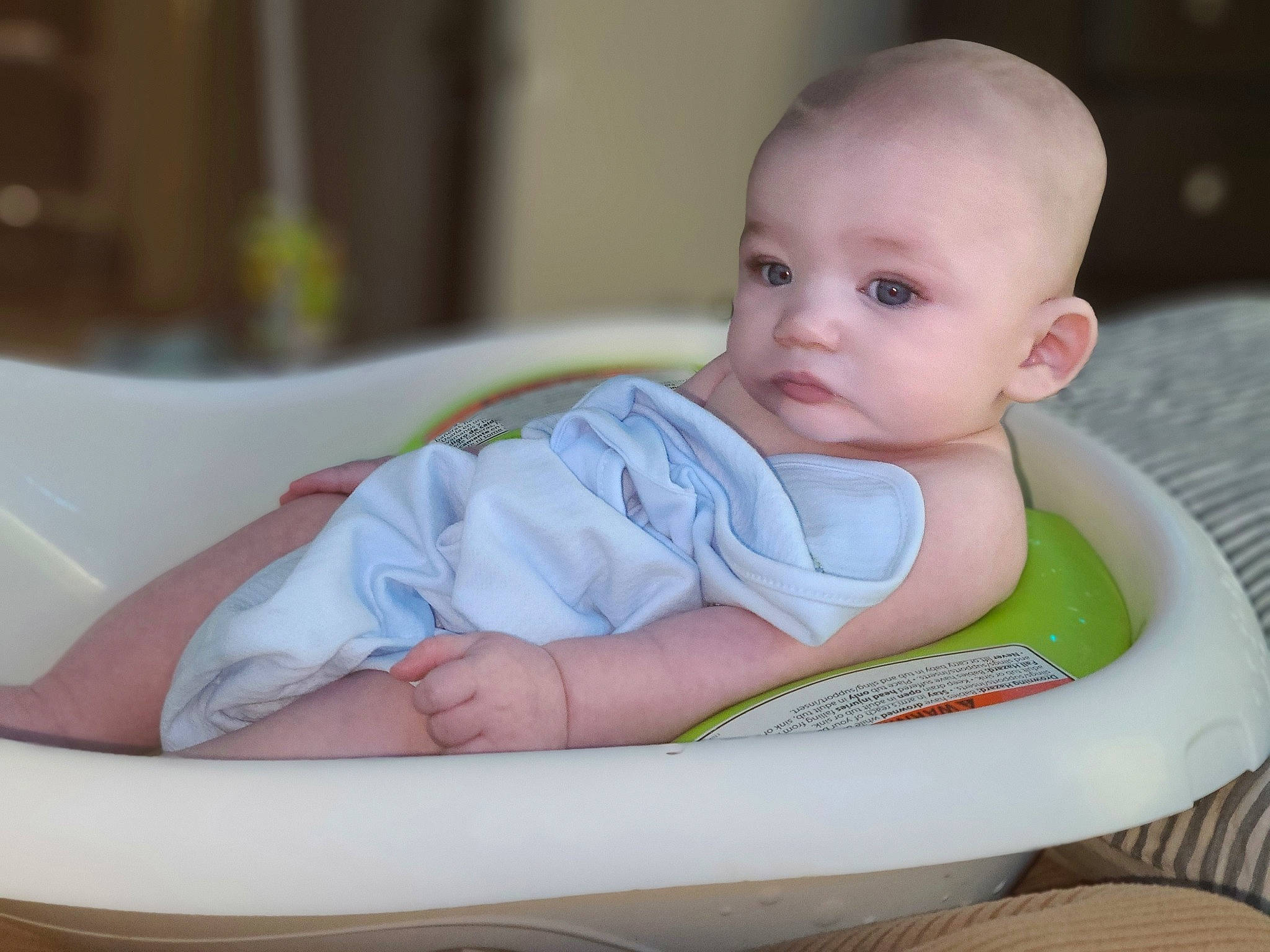 Everett is registered to the contest to win money with this photo: baby, baby_products, baby_safety, baby_toddler_clothing, bib, cheek, child, chin, circle, comfort, eye, person, room, sitting, skin, sleeve, toddler