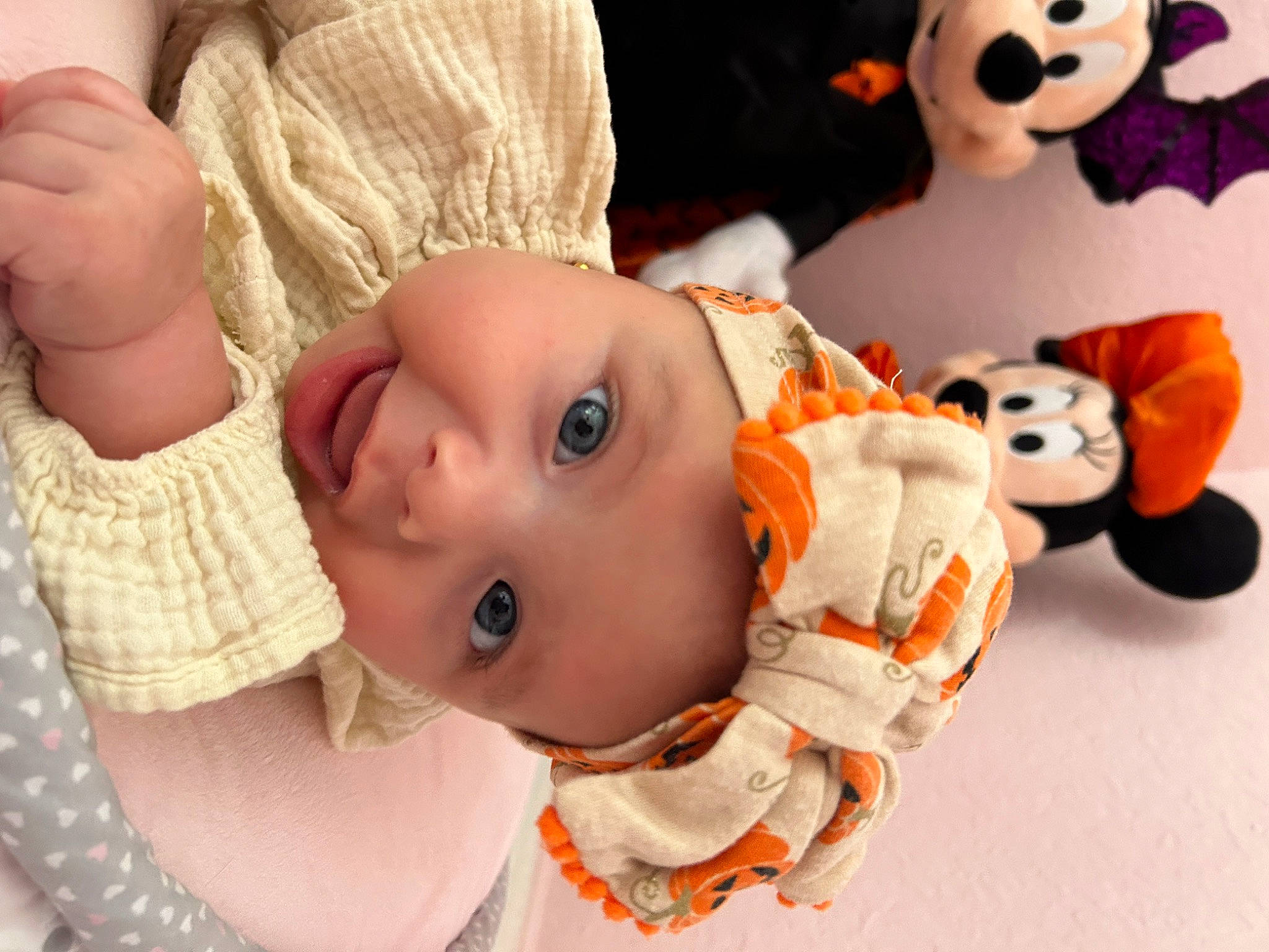Gabriella is registered to the contest to win money with this photo: baby, baby_toddler_clothing, cheek, child, chin, eye, eyelash, face, facial_expression, fun, happy, head, headwear, iris, lip, nose, orange, person, skin, sleeve
