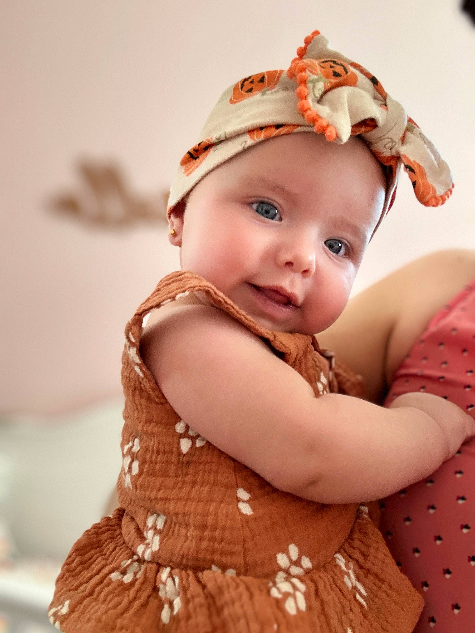 Gabriella is registered to the contest to win money with this photo: baby, baby_toddler_clothing, cap, cheek, child, day_dress, embellishment, eyelash, flash_photography, happy, headband, headgear, headpiece, headwear, iris, jewellery, lip, person, skin, sleeve