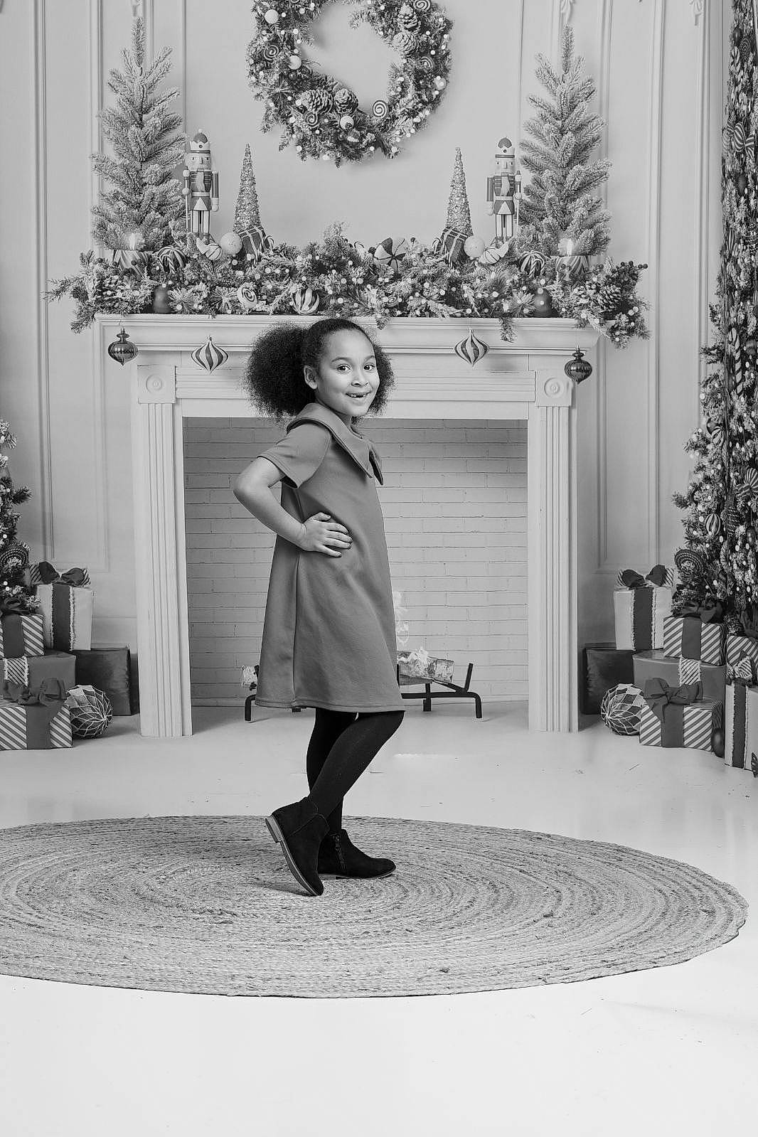 Kayden is registered to the contest to win money with this photo: beauty, black, black_and_white, christmas_decoration, christmas_ornament, christmas_tree, evergreen, joy, knee, monochrome, monochrome_photography, ornament, people, person, photograph, plant, sleeve, snapshot, standing, style