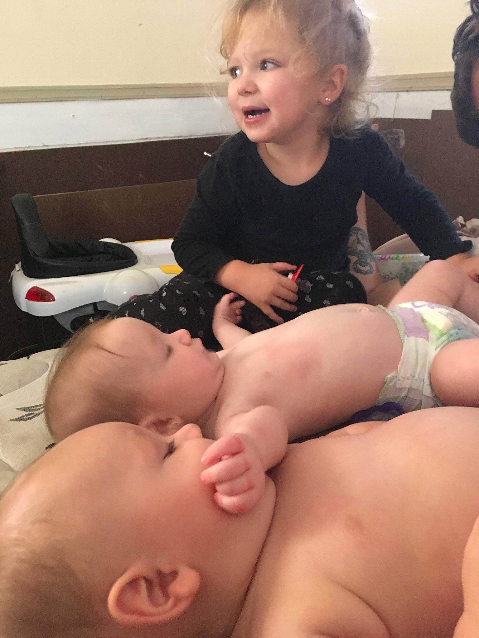 Kenzie is registered to the contest to win money with this photo: child, finger, girl, hand, infant, joy, leg, mother, mouth, person, toddler