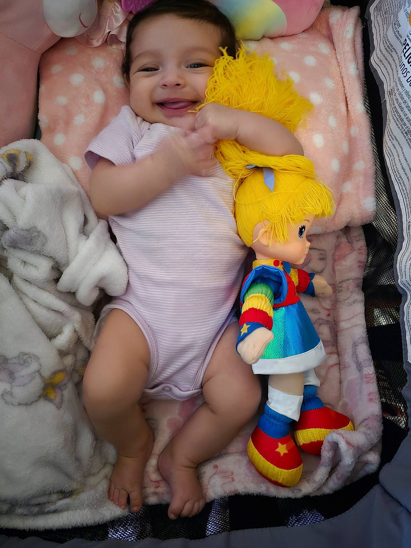 Krystal is registered to the contest to win money with this photo: baby, bed, blanket, bodypart, clothing, couch, doll, face, finger, furniture, hand, head, homedecor, hosiery, person, photography, plush, portrait, sock, toy