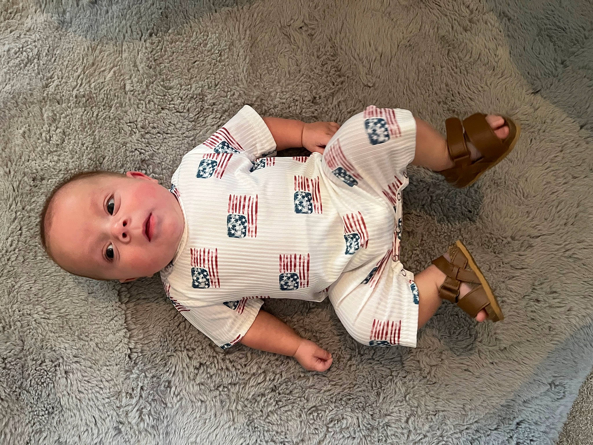 Jordyn joined the competition — help win amazing prizes! abdomen, baby, baby_toddler_clothing, barefoot, chest, comfort, elbow, finger, flooring, foot, grass, happy, human_leg, knee, leg, mammal, person, sitting, thigh, trunk