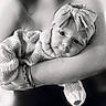 Lysie participe au concours pour gagner de l'argent avec cette photo : baby, infant, child, headband, bow, knitted_sweater, arm, person, portrait, black_and_white, soft_focus, cozy, cute, resting, closeup, young_child, candid, warmth, family, love
