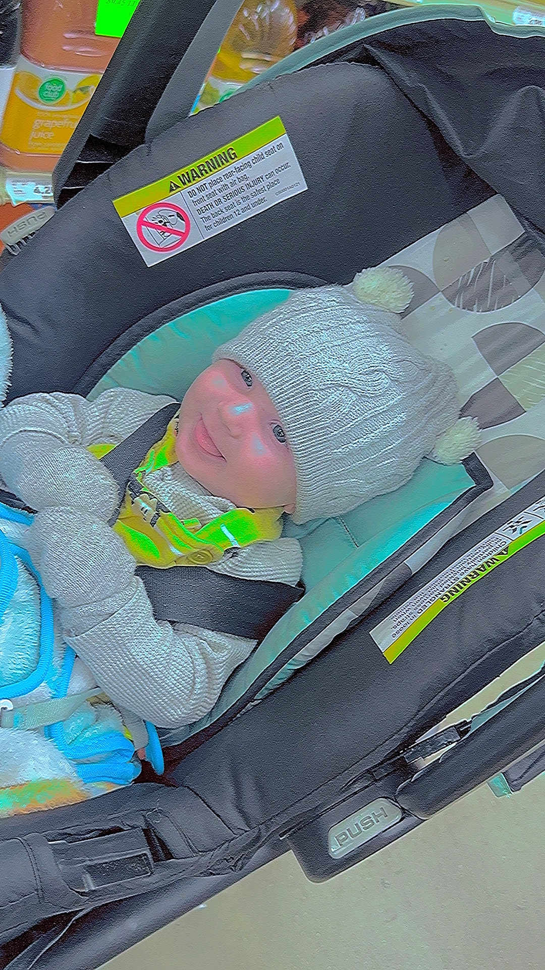 Linux Cole joined the competition — help win amazing prizes! baby, beanie, bonnet, cap, car, car_interior, carseat, clothing, face, hat, head, knitwear, machine, person, photography, spoke, stroller, sweater, transportation, vehicle