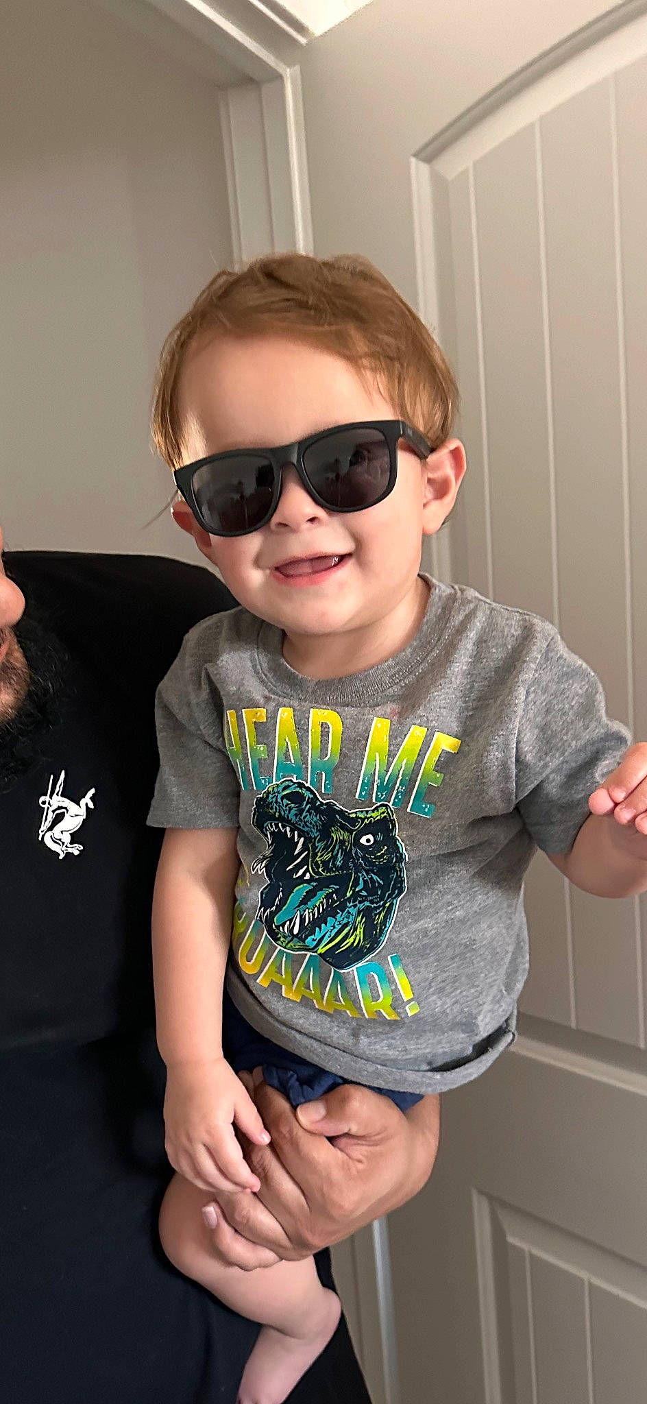 Kylo joined the competition — help win amazing prizes! baby_toddler_clothing, cheek, chin, eyewear, facial_expression, finger, forehead, glasses, goggles, happy, joy, mouth, neck, person, skin, sleeve, smile, sunglasses, t_shirt, vertebrate