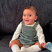 Dulce María Corona joined the competition — help win amazing prizes! baby, child, smiling, sitting, couch, clothing, dress, socks, bottle, happy, indoor, cute, person, face, head, hair, skin, comfort, young, portrait