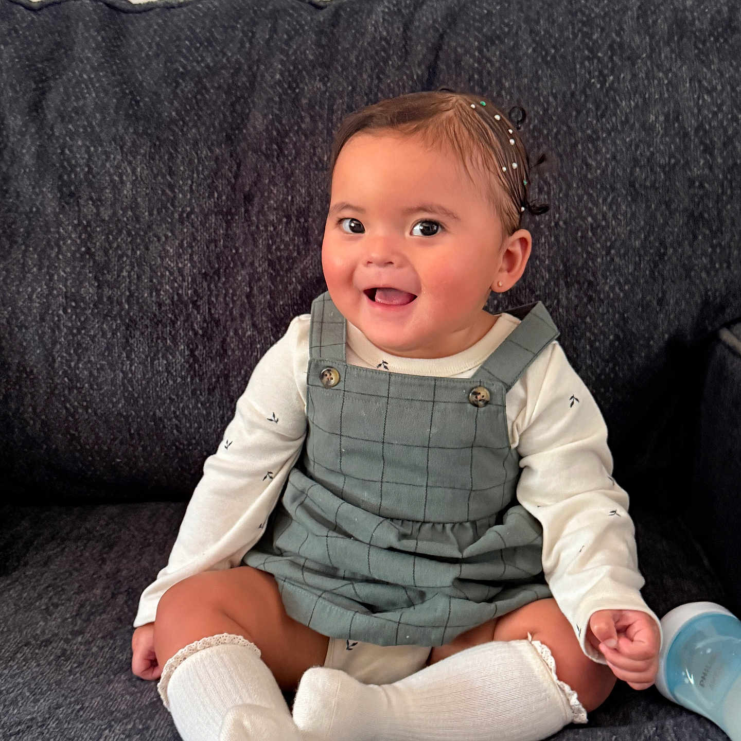 Dulce María Corona joined the competition — help win amazing prizes! baby, bottle, child, clothing, comfort, couch, cute, dress, face, hair, happy, head, indoor, person, portrait, sitting, skin, smiling, socks, young