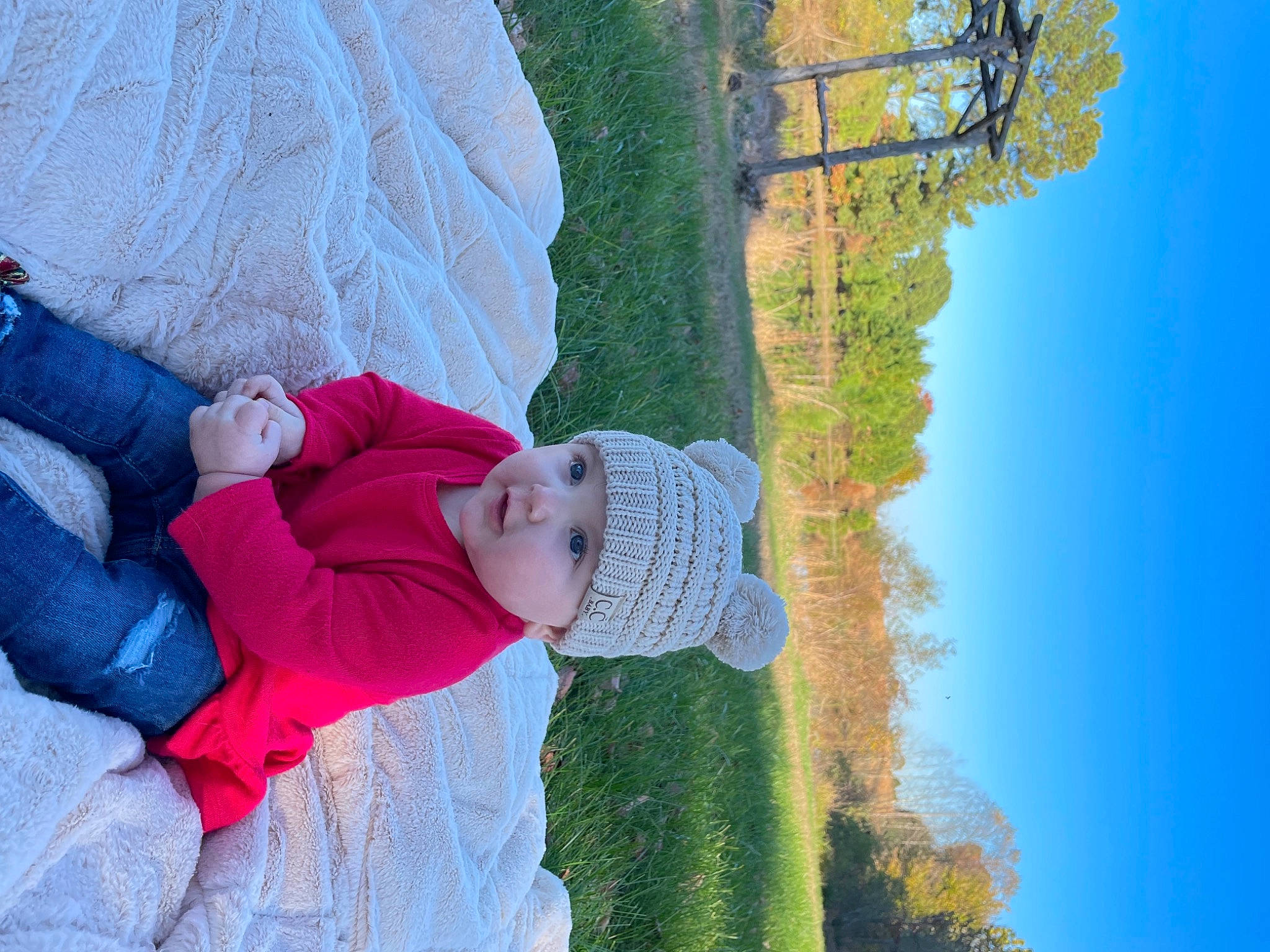 Raelynn joined the competition — help win amazing prizes! azure, baby, blue, fun, grass, happy, hat, headwear, landscape, leaf, leisure, organism, people_in_nature, person, plant, recreation, sky, spring, toddler, travel