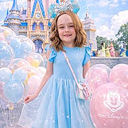 Charlotte joined the competition — help win amazing prizes! child, girl, blue_dress, mickey_mouse_ears, balloons, castle, disney, smile, outdoor, theme_park, happy, portrait, fantasy, pink, pastel_colors, cloudy_sky, crossbody_bag, curly_hair, tourist, magical