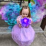 child, girl, princess_dress, purple_dress, bench, outdoor, magic_effect, fantasy, glowing_hands, colorful_mist, park, concrete, grass, braided_hair, imagination, fairy_wings_effect, costume, playful, young, sitting