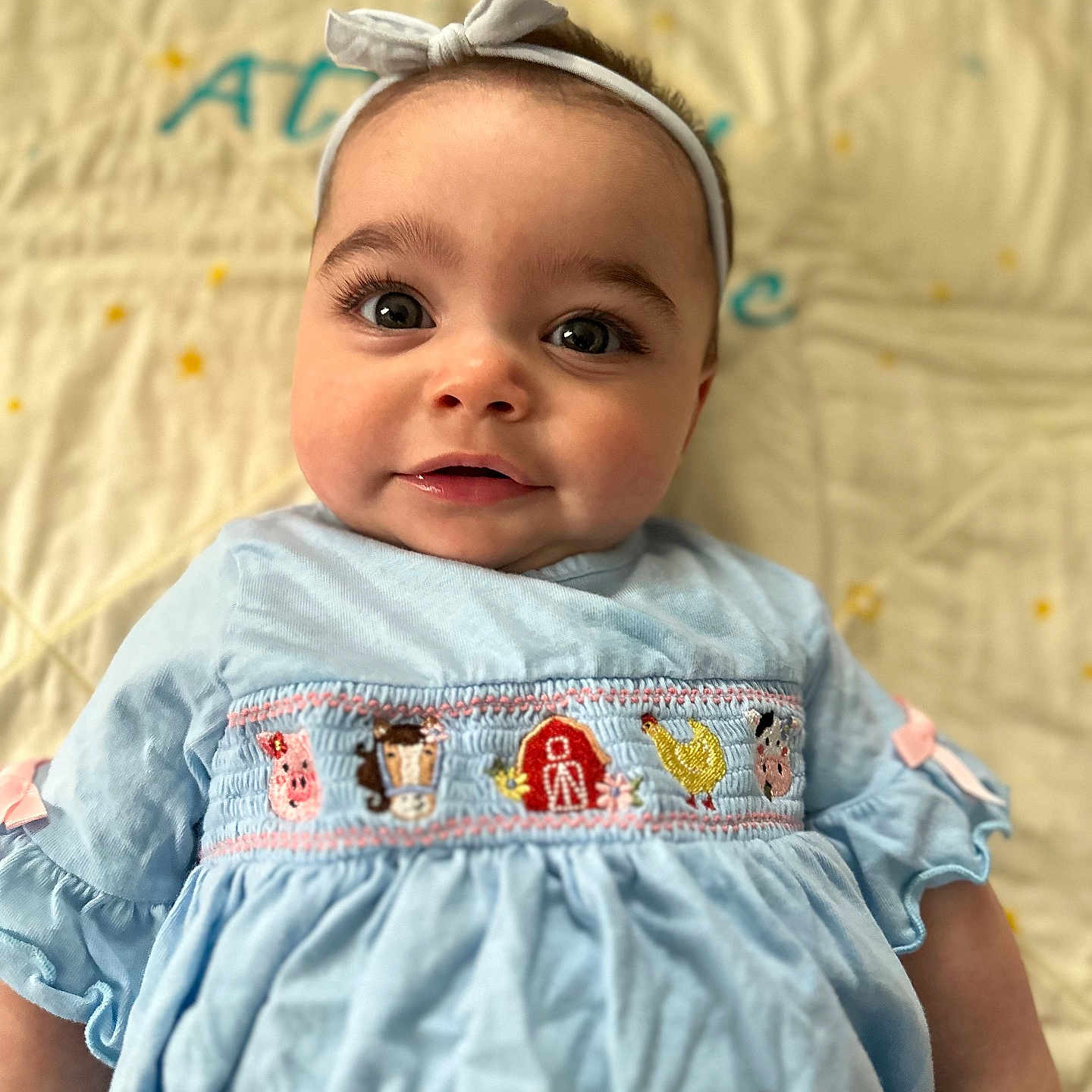Attaley is registered to the contest to win money with this photo: accessories, baby, bed, clothing, dress, face, furniture, hat, head, headband, jeans, jewelry, newborn, pants, person, photography, portrait, sitting, sleeve, t_shirt