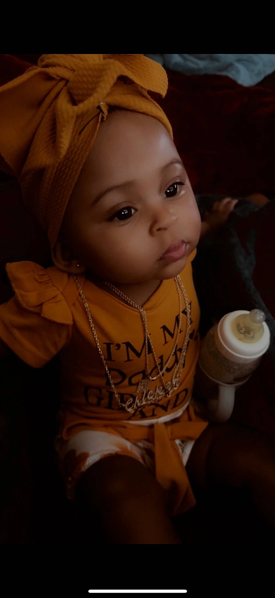 Aaleyah joined the competition — help win amazing prizes! baby, baby_products, cap, chest, child, cup, drinkware, fashion_accessory, fun, happy, hat, head, headgear, human_body, person, personal_protective_equipment, portrait_photography, sitting, skin, toddler