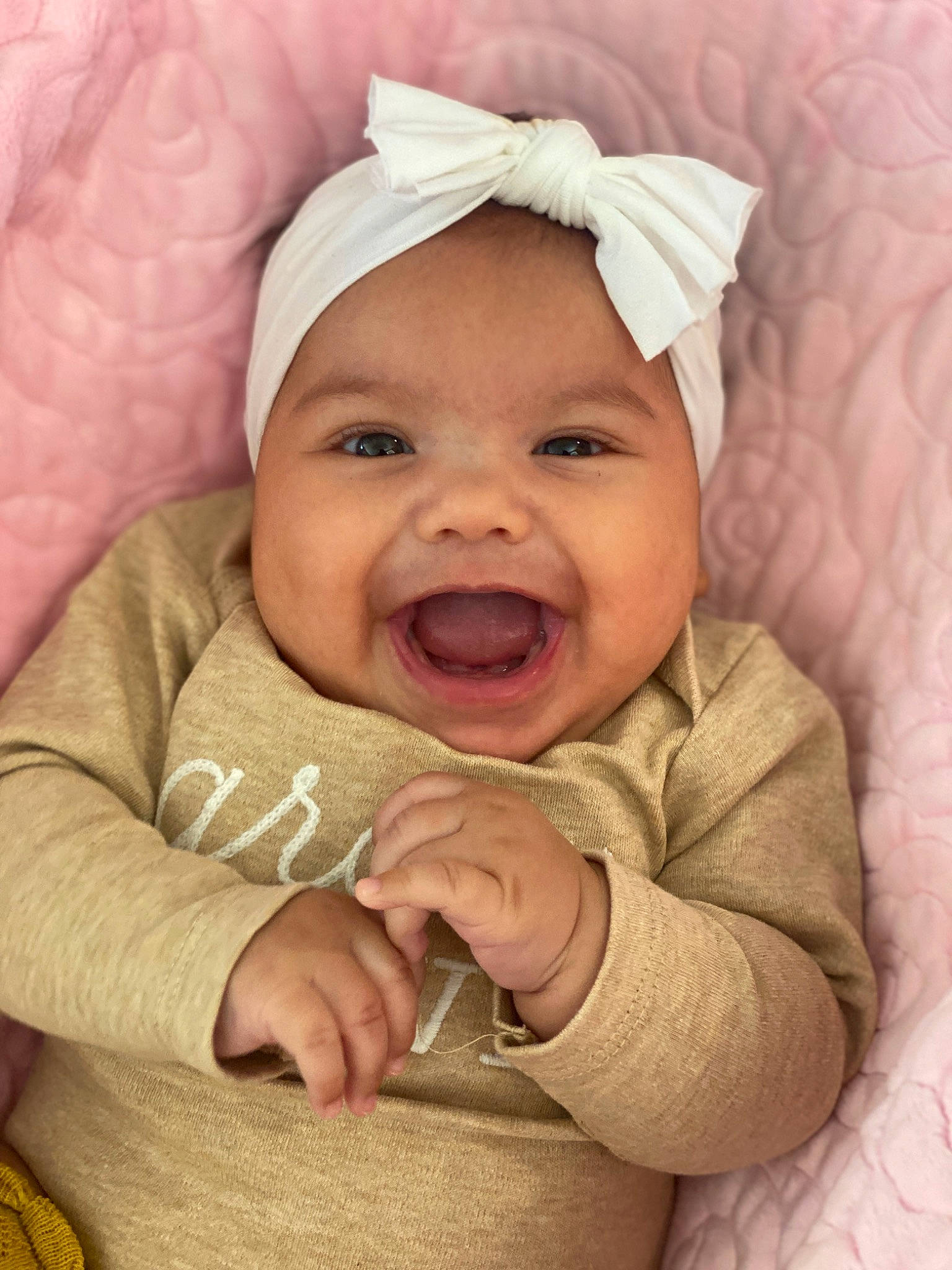 Olivia joined the competition — help win amazing prizes! cheek, comfort, eye, eyebrow, facial_expression, finger, gesture, happy, head, headwear, human_body, iris, lip, mouth, nose, person, pink, product, skin, sleeve