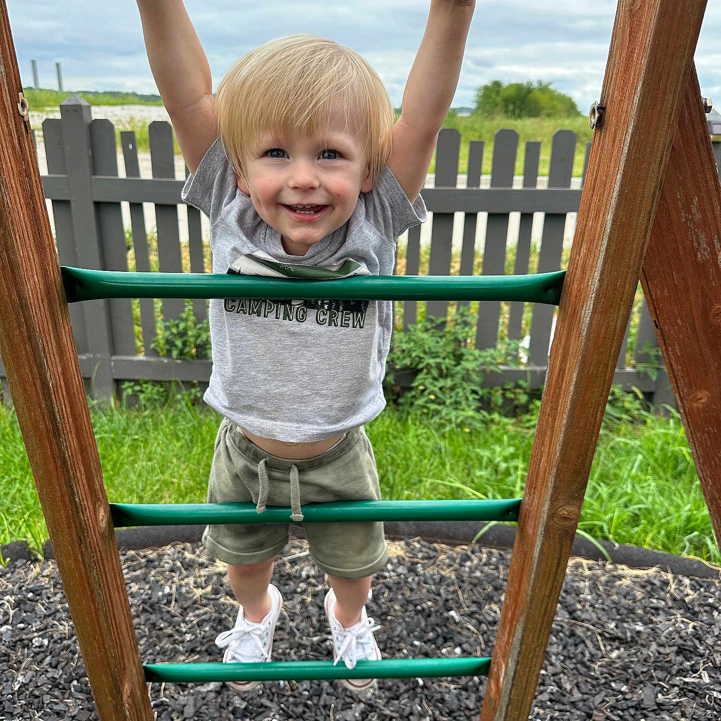 Asher is registered to the contest to win money with this photo: backyard, boy, child, clothing, face, footwear, grass, head, male, nature, outdoorplayarea, outdoors, park, person, photography, plant, playarea, portrait, shoe, yard