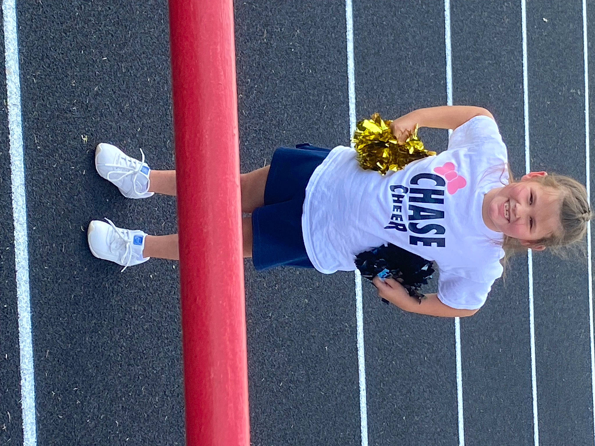 Reagan joined the competition — help win amazing prizes! carmine, championship, competition_event, electric_blue, fun, grass, hat, human_leg, jersey, joy, leisure, net, person, plant, player, recreation, shorts, sneakers, sports, sports_equipment