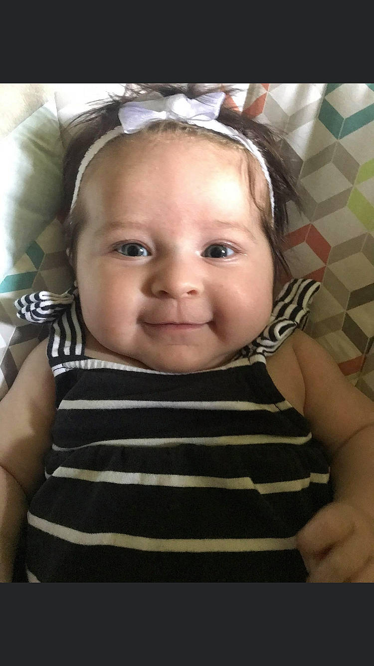 Aniston joined the competition — help win amazing prizes! baby, cheek, child, cool, ear, eye, face, forehead, hair_accessory, head, mouth, nose, person, skin, smile, toddler