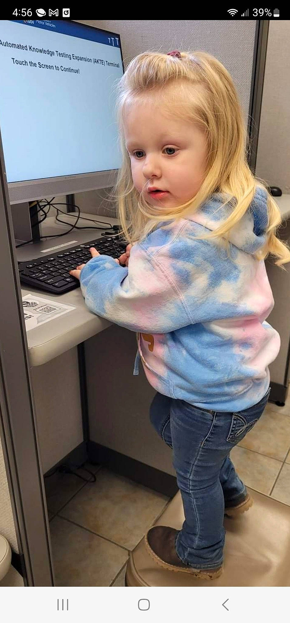 Nalani is registered to the contest to win money with this photo: baby_toddler_clothing, blond, child, computer, computer_desk, computer_keyboard, computer_monitor, desk, eye, eyelash, face, input_device, jeans, office_equipment, office_supplies, output_device, peripheral, person, sleeve, standing