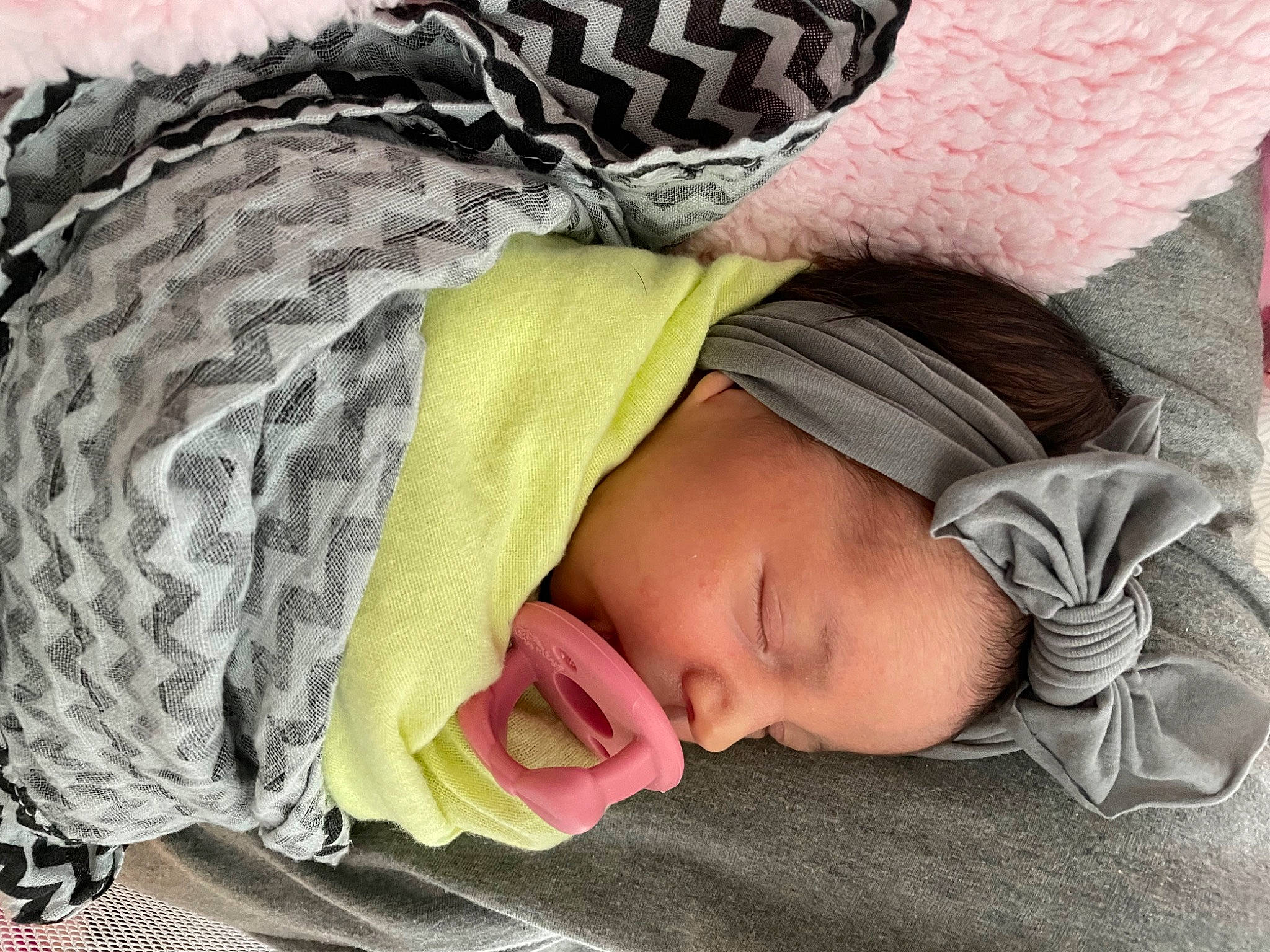 Alice joined the competition — help win amazing prizes! baby, baby_products, baby_sleeping, bedding, bedtime, comfort, cool, face, fashion_accessory, grass, happy, headgear, headwear, knit_cap, linens, pattern, person, skin, sleeve, textile
