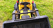 Eléna a rejoint le concours — aidez-le/la à gagner de superbes lots ! backyard, child, construction_toy, cute, daylight, excavator, fun, grass, greenery, outdoor, pacifier, person, play, sitting, steering_wheel, toddler, toy, vehicle, yellow_pajamas, young_child