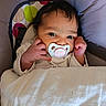Leeroy participe au concours pour gagner de l'argent avec cette photo : baby, infant, pacifier, blanket, cushion, seat, hand, face, expression, clothing, indoors, portrait, cute, newborn, child, skin, hair, comfort, relax, baby_gesture