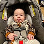 Blakely joined the competition — help win amazing prizes! baby, buckle, canopy, car_seat, clothing, cute, expression, grocery_store, hand, infant, leopard_print, portrait, rosy_cheeks, safety, seatbelt, shopping, soft_lighting, supermarket, tongue_out, warning_label