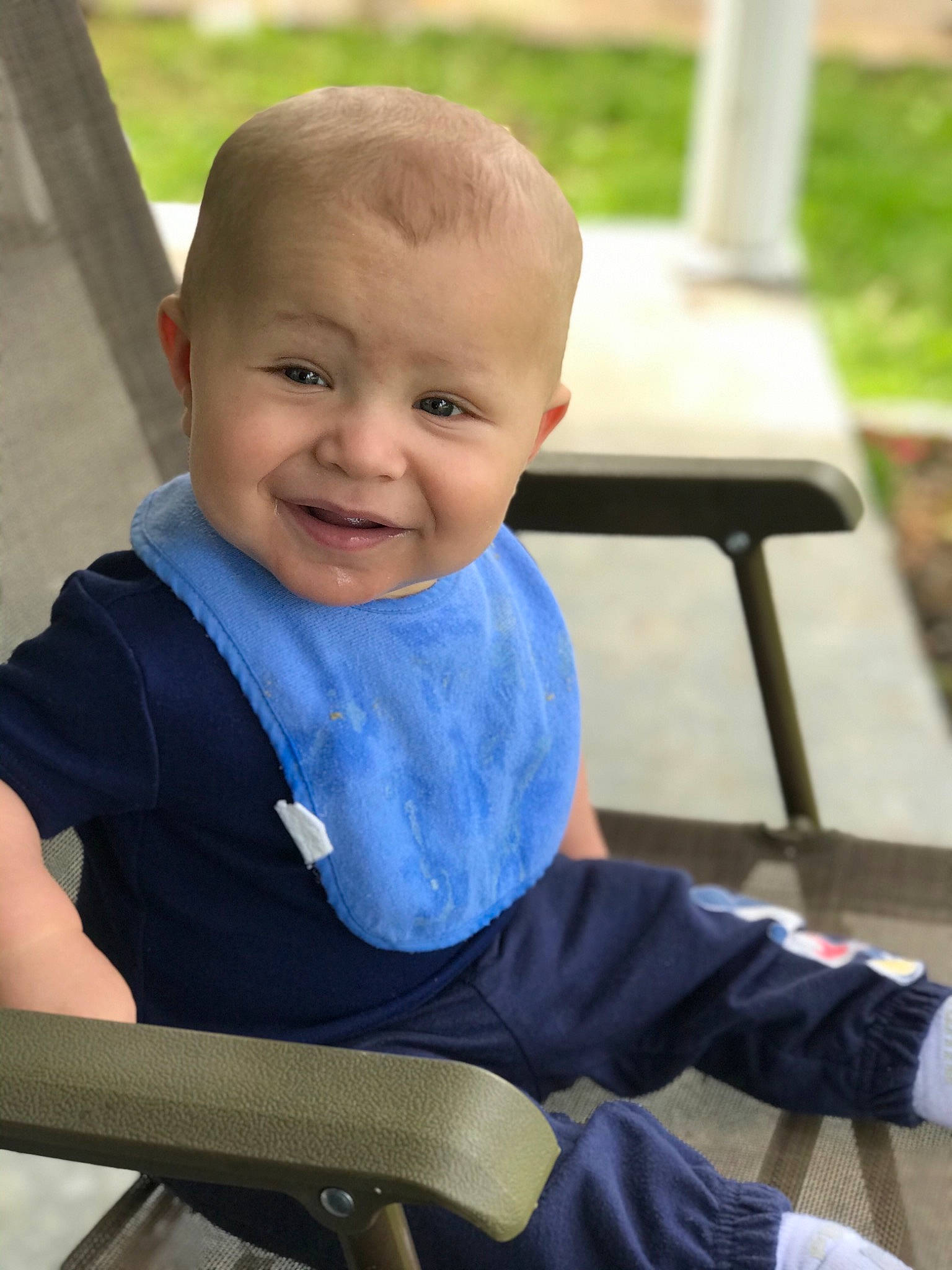 Tre is registered to the contest to win money with this photo: baby, baby_toddler_clothing, chair, cheek, chin, eye, facial_expression, finger, grass, hairstyle, happy, human, human_body, iris, leisure, person, product, skin, sleeve, smile