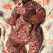 Kay Michelle joined the competition — help win amazing prizes! baby, blanket, child, closed_eyes, cozy, cute, floral_pattern, hands, head, indoor, infant, nursery, onesie, pacifier, peaceful, pink, resting, sleeping, soft_texture, young_child