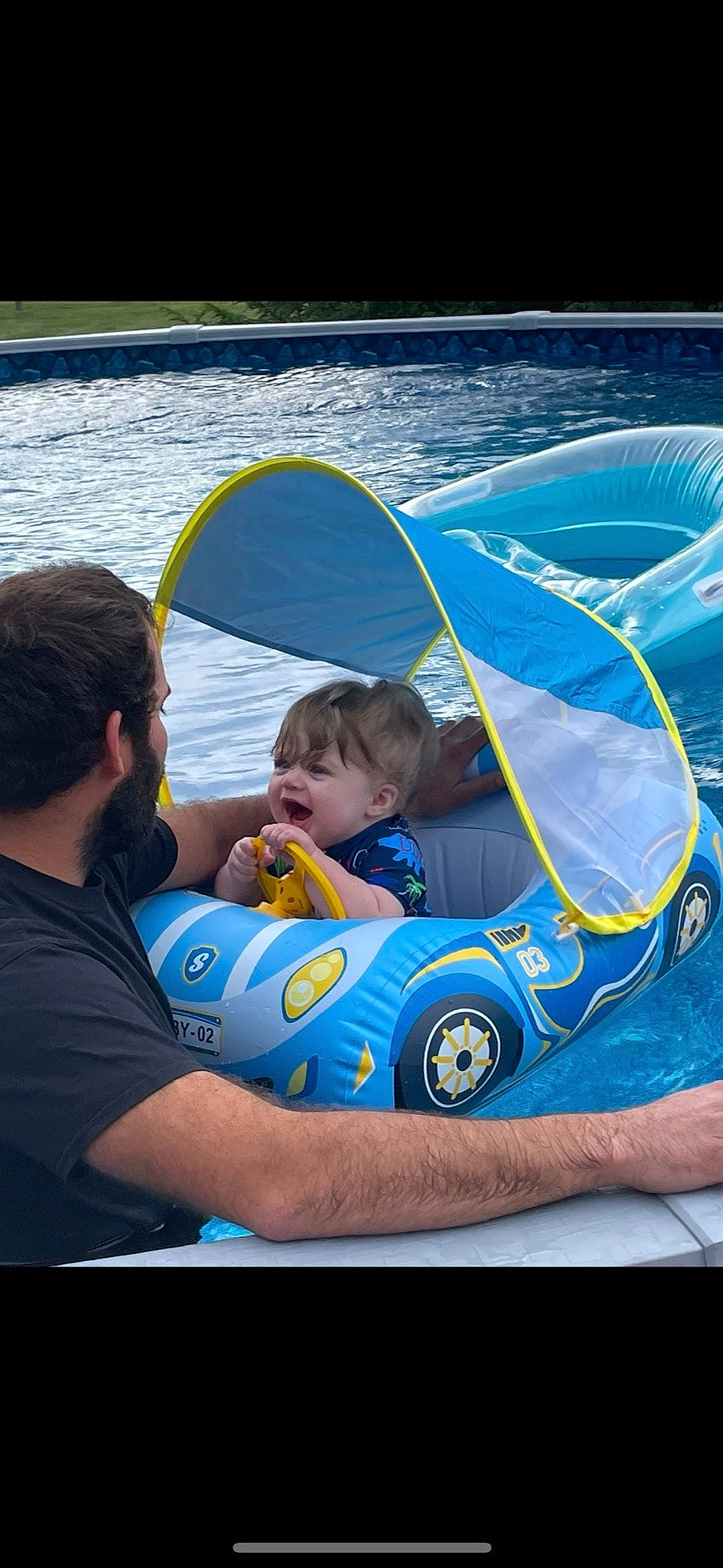 Oaklee joined the competition — help win amazing prizes! automotive_design, automotive_exterior, baby, baby_float, baby_products, child, electric_blue, fun, grass, happy, leisure, motor_vehicle, person, personal_protective_equipment, recreation, sky, toddler, travel, vehicle_door, water