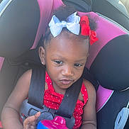 Nazaria joined the competition — help win amazing prizes! toddler, child, car_seat, sippy_cup, hair_bows, red_clothing, seat_belt, car_interior, safety, cute, baby, young_child, black_hair, pink, blue, drink_container, car_headrest, window_light, seat, portrait