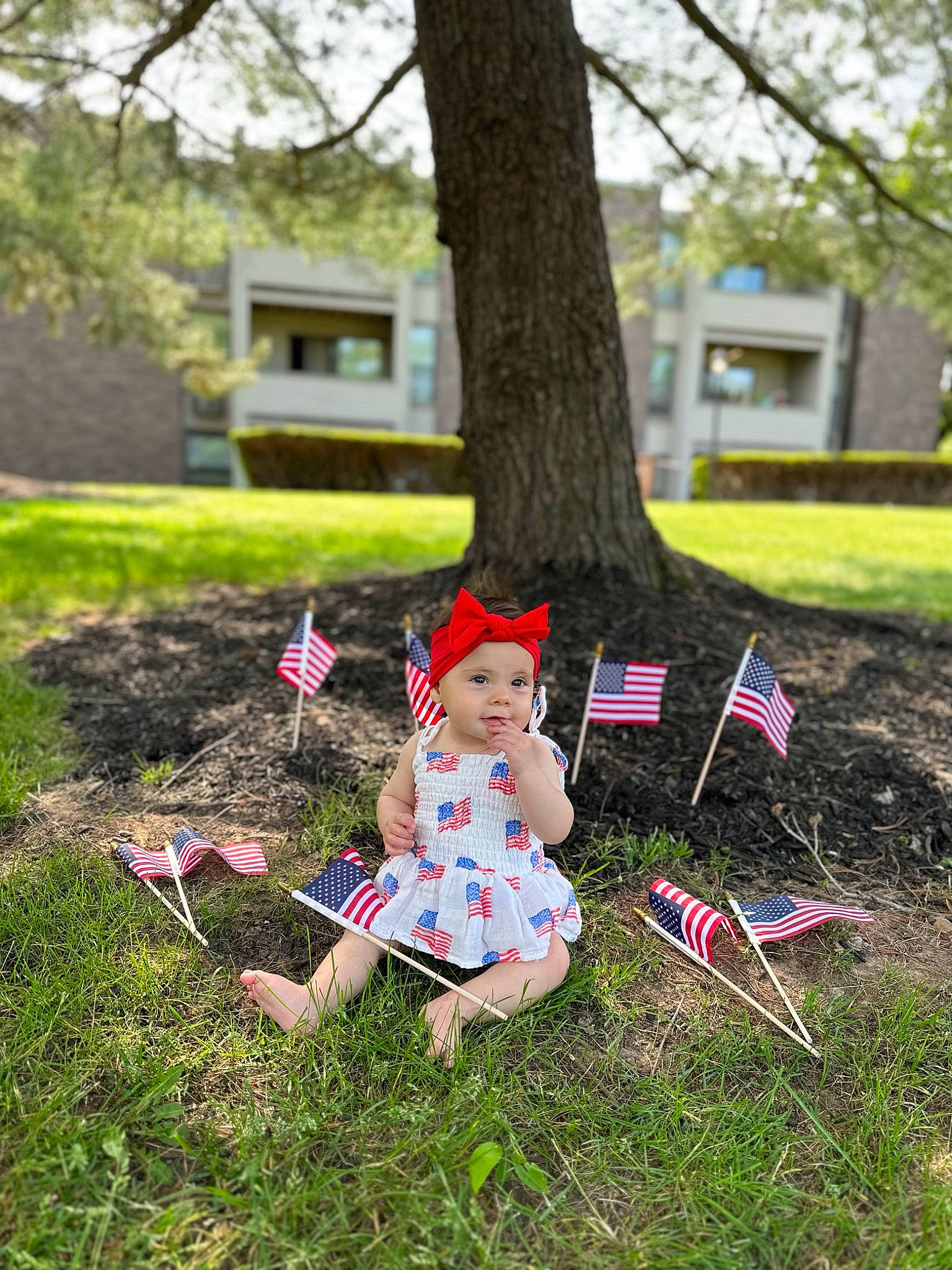 Delaney is registered to the contest to win money with this photo: garden, grass, grass_family, grassland, groundcover, hat, headwear, lawn, lawn_ornament, leaf, leisure, mammal, meadow, people_in_nature, person, plant, recreation, soil, spring, toy