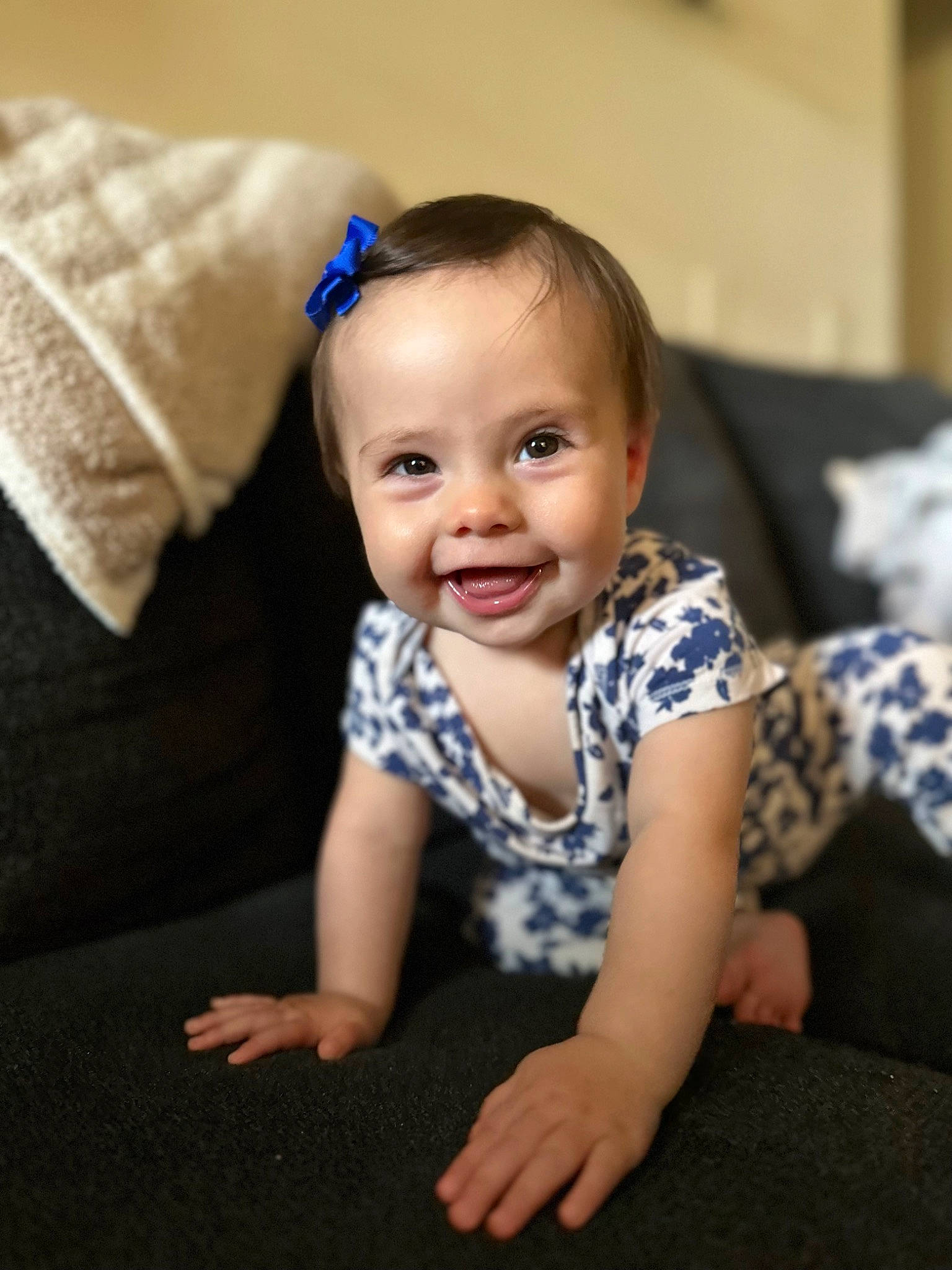 Delaney joined the competition — help win amazing prizes! arm, baby, baby_toddler_clothing, cheek, chin, comfort, couch, electric_blue, eye, flash_photography, flooring, fun, happy, iris, joy, person, sitting, skin, sleeve, smile
