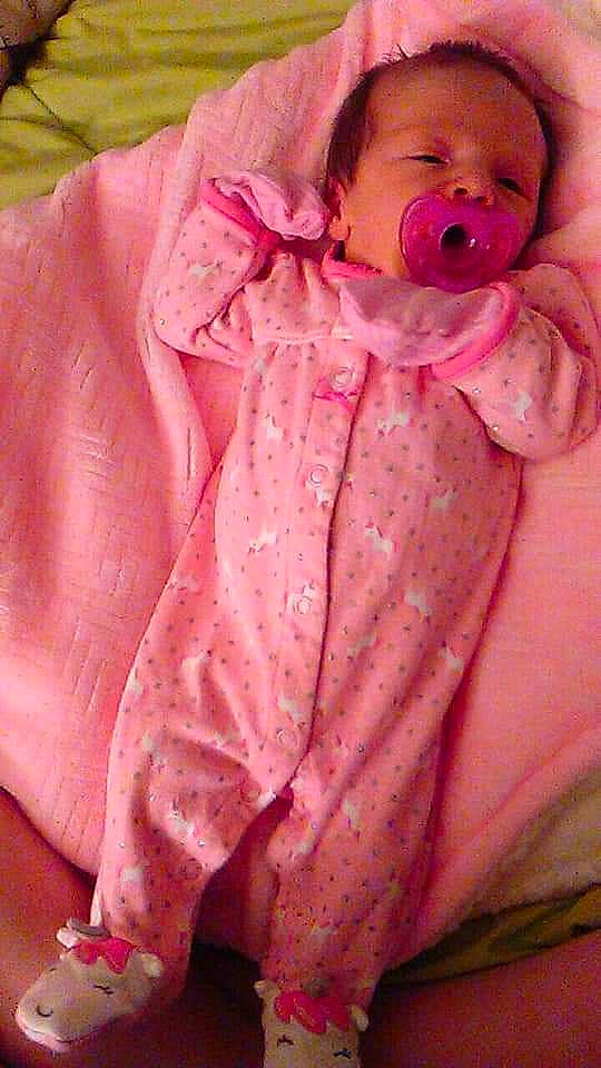 Delilah Rayne is registered to the contest to win money with this photo: baby, cheek, child, flesh, linens, mouth, peach, person, pink, skin, sleep, textile, toddler