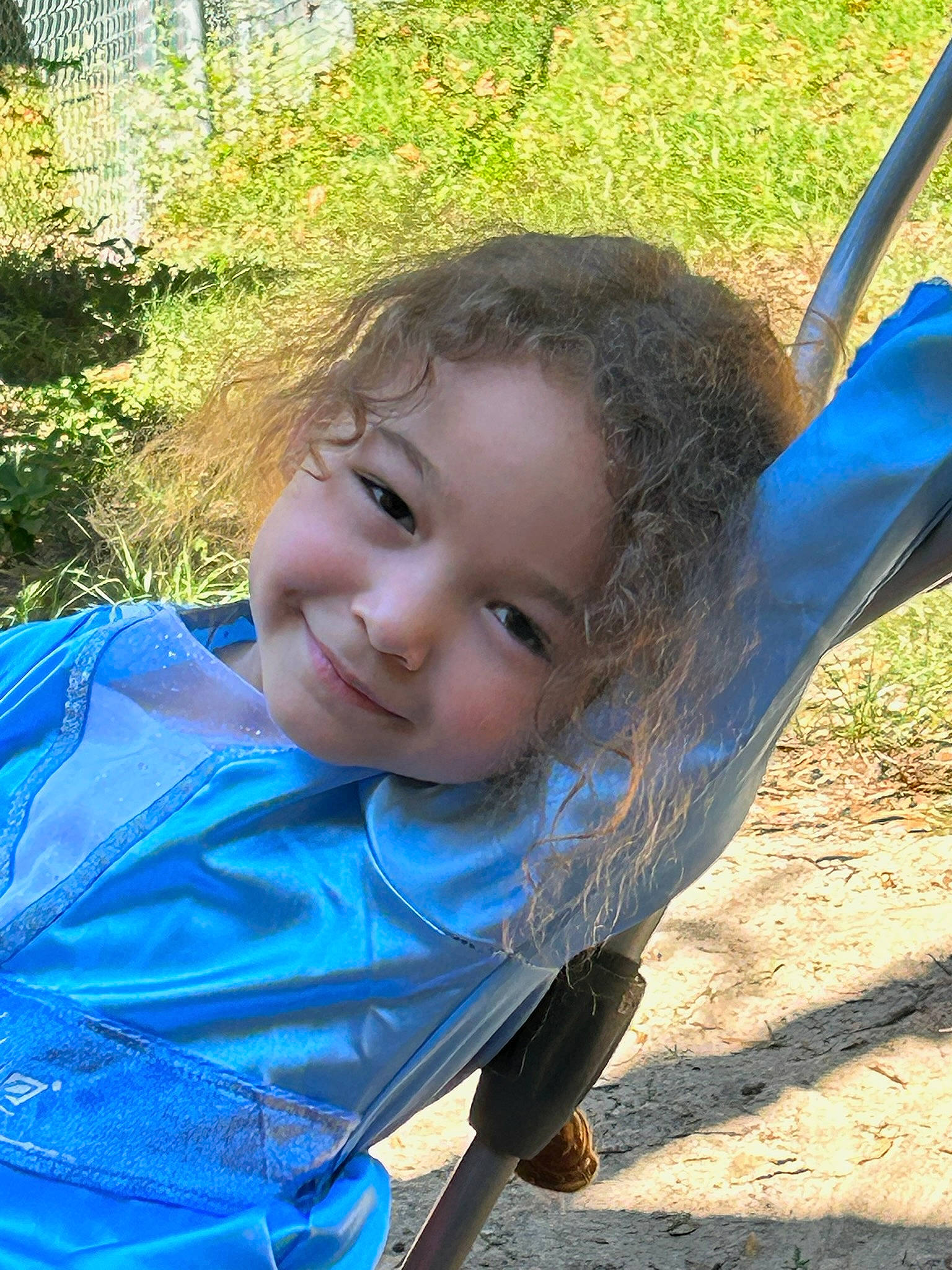 Hayvenley is registered to the contest to win money with this photo: baby, blue, child, city, electric_blue, fun, grass, happy, iris, joy, leisure, people_in_nature, person, plant, recreation, sitting, skin, smile, swing, toddler