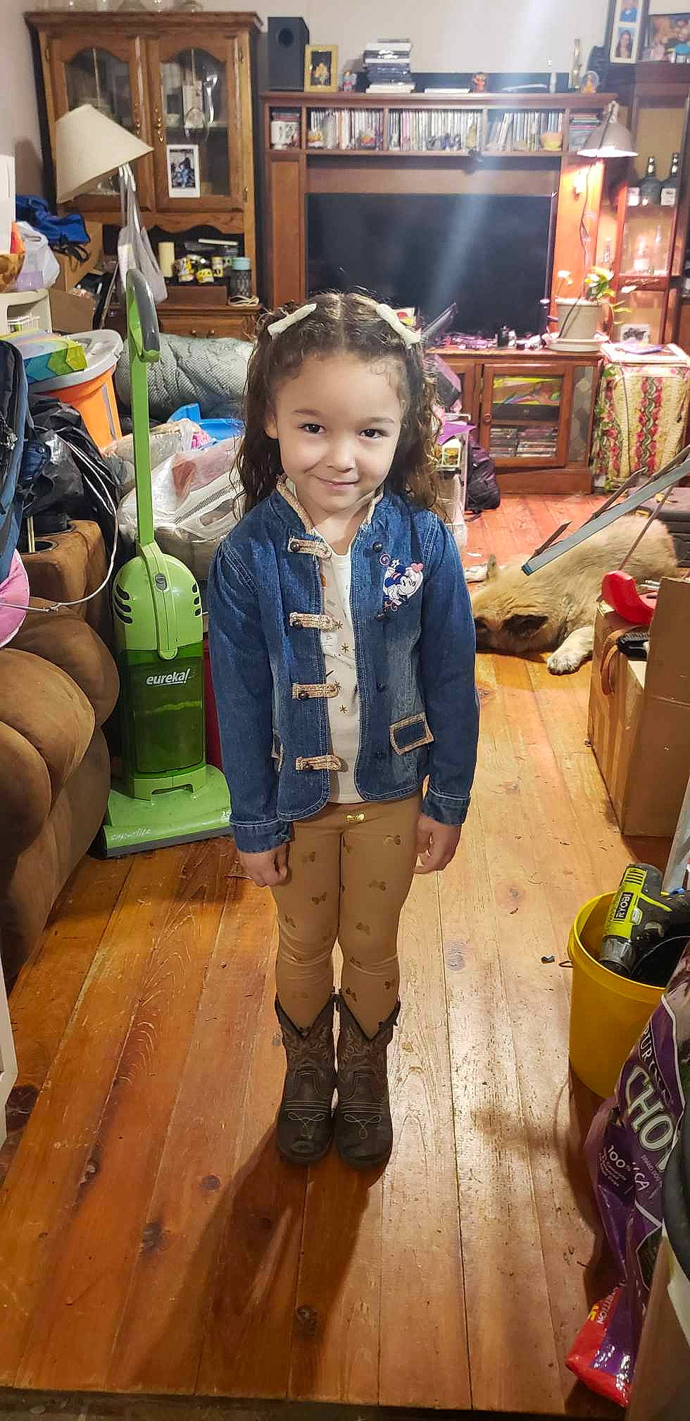 Hayvenley is registered to the contest to win money with this photo: backpack, bag, boot, box, child, denim, fashion_accessory, flooring, fun, hardwood, joy, luggage_and_bags, person, room, shelf, shipping_box, shopping, smile, standing, toddler