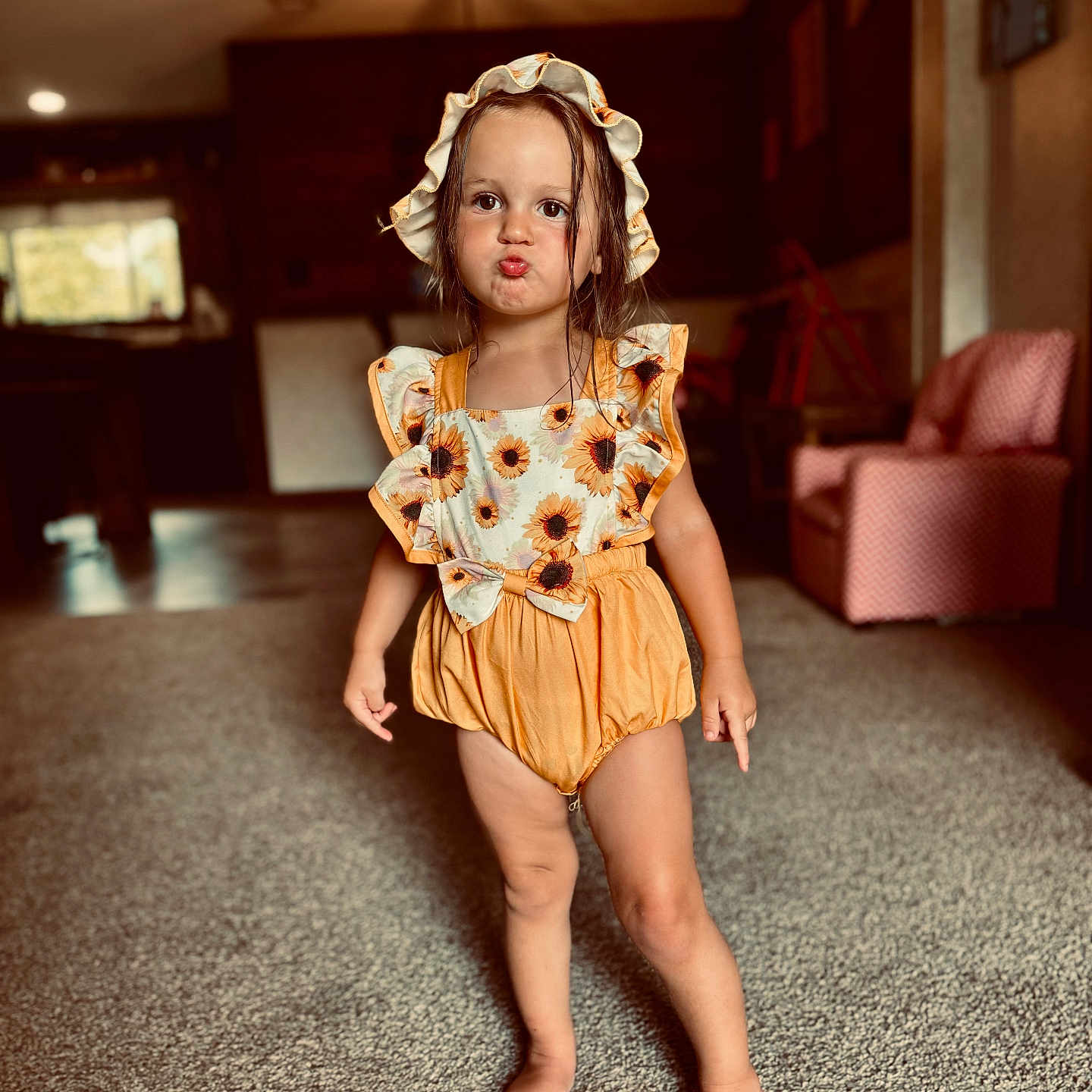 Ellie is registered to the contest to win money with this photo: architecture, beachwear, child, clothing, couch, dress, face, fashion, female, formalwear, furniture, girl, hardwood, hat, head, person, photography, portrait, sitting, wood
