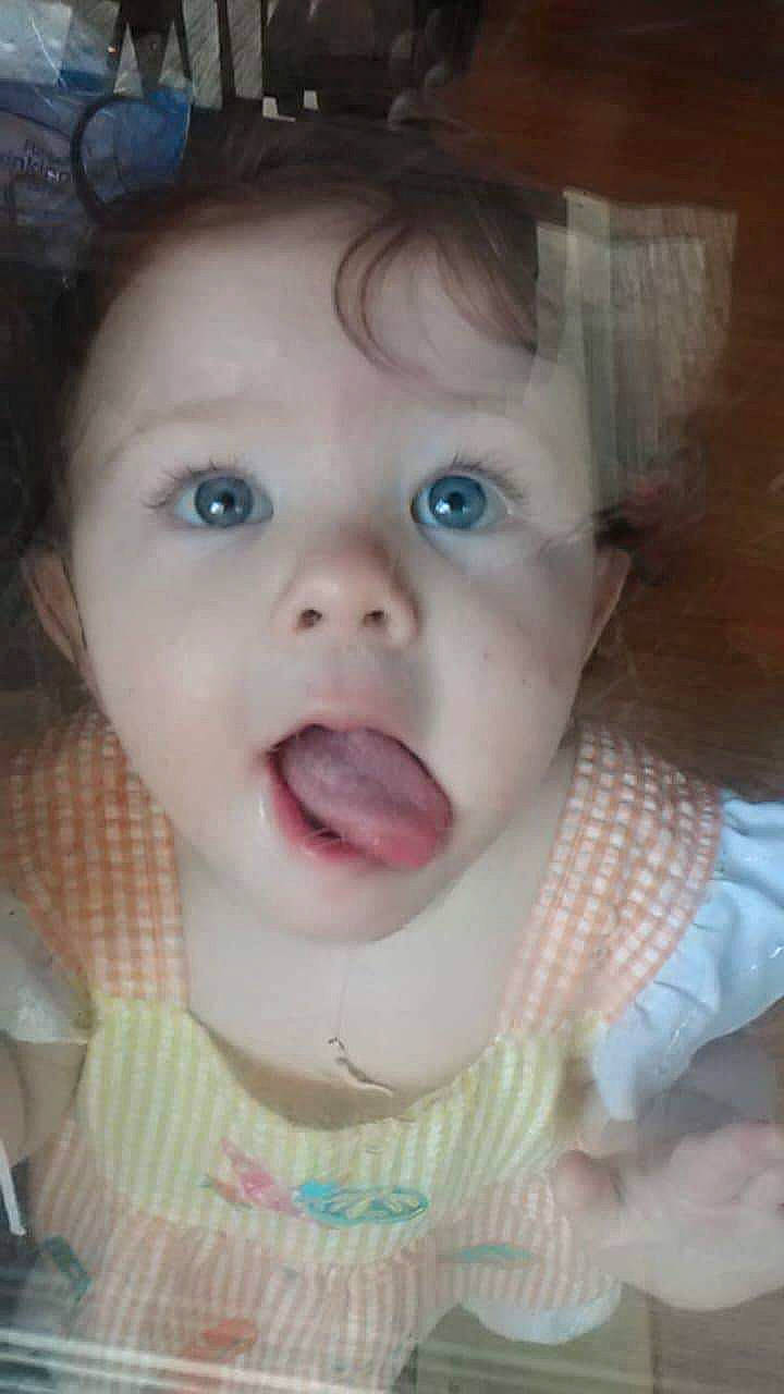 Stacy is registered to the contest to win money with this photo: baby, beauty, cheek, child, chin, eye, eyebrow, face, facial_expression, forehead, fun, head, lip, mouth, nose, organ, person, skin, smile, surprise