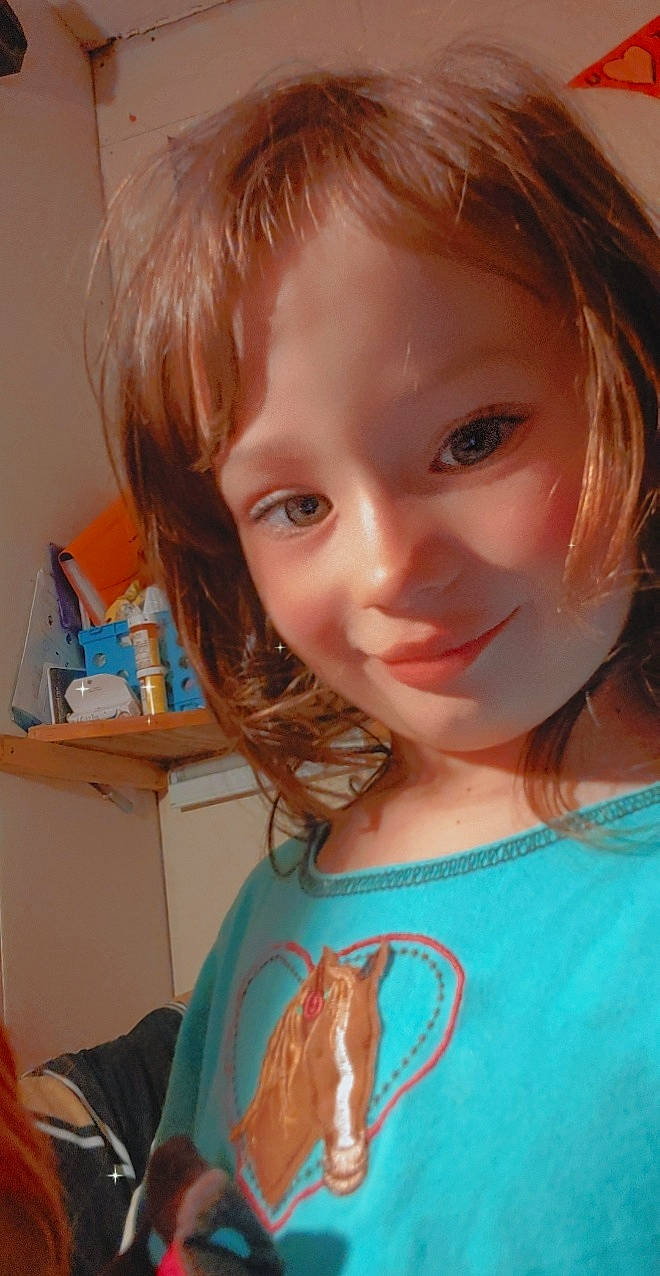 Hartley joined the competition — help win amazing prizes! bangs, cheek, child, chin, eyelash, food, happy, iris, jaw, joy, layered_hair, lip, long_hair, mouth, nose, organ, people, person, skin, smile