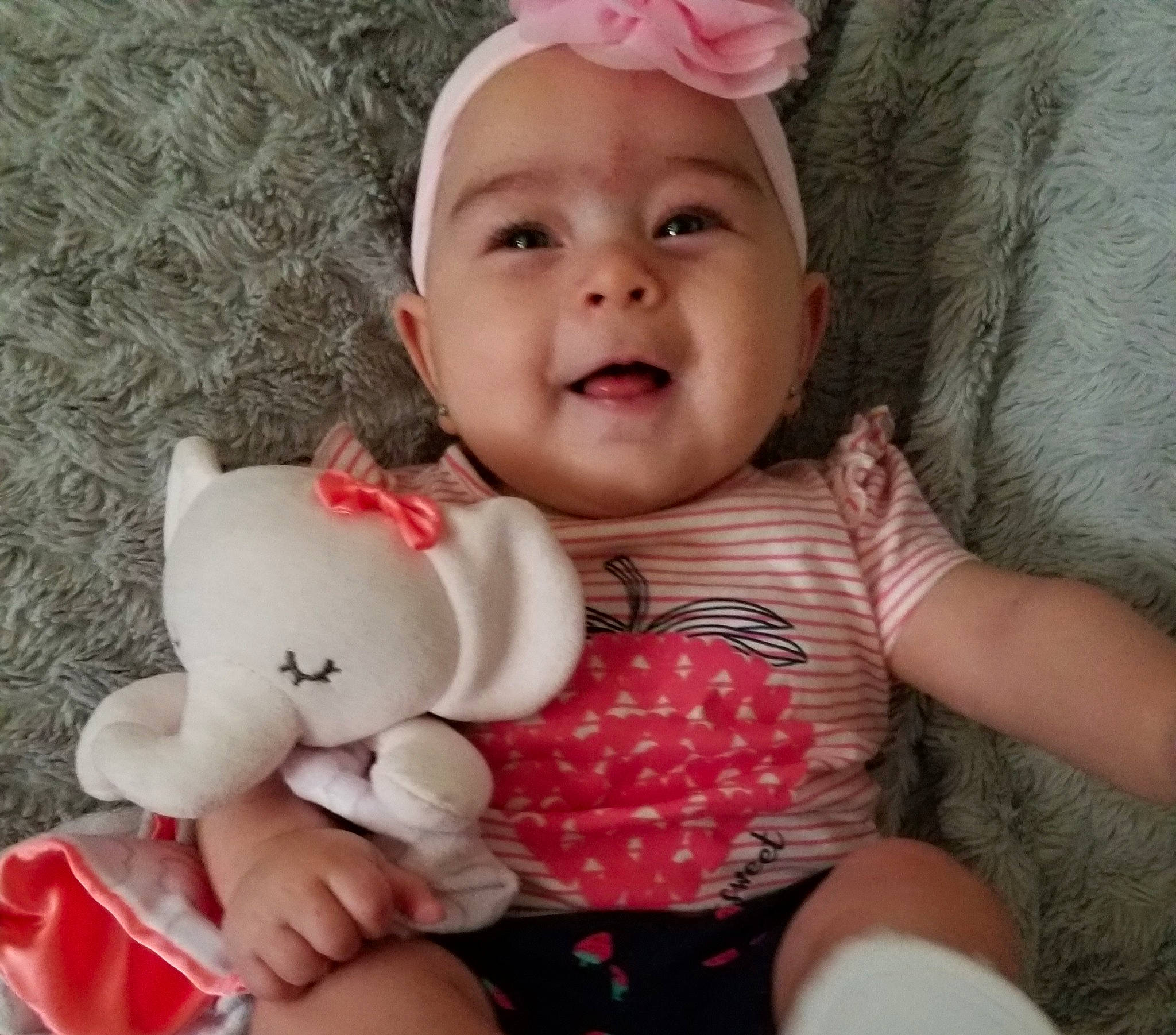 Crimson joined the competition — help win amazing prizes! baby, baby_laughing, baby_making_funny_faces, baby_toddler_clothing, cheek, child, hand, happy, head, lip, person, pink, play, skin, smile, stuffed_toy, toddler