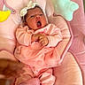 Renatta is registered to the contest to win money with this photo: baby, baby_seat, child, closeup, comfort, cute, hand, headband, indoors, infant, newborn, person, pink_clothing, plush_toy, portrait, resting, sleepy, soft_fabric, toddler, yawning
